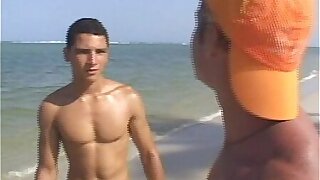 Hot gay threesome shagging on the beach