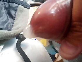 Jacking off my uncut cock, debilitating a condom, cumming median a condom. May 28, 2023.