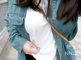 Asian woman expose the brush tits on poblic
