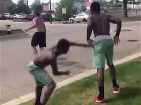 Two big boys slap each other