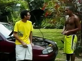 Smart curly dude Wellington had disconnected spark plugs in advance and came to help his  black-a-vised friend  Lindberg Sisso to fix his car