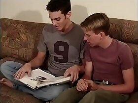 Slim young gay blonde in white socks rides his nefarious haired friend's hard cock